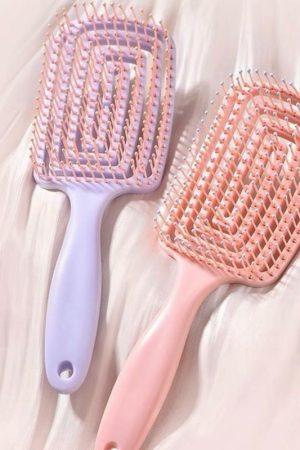 Wide curved comb for brushing
